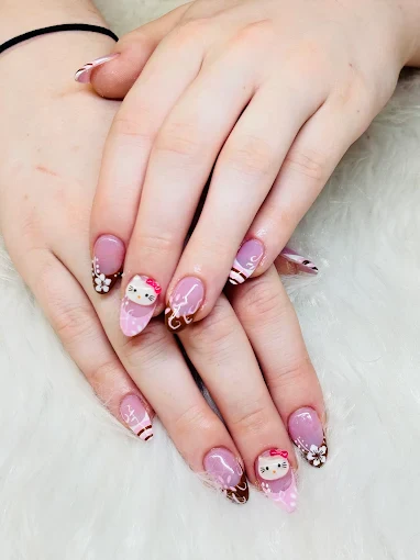 Blush pink character nail art with sculpted details by Top 10 Nails Spa