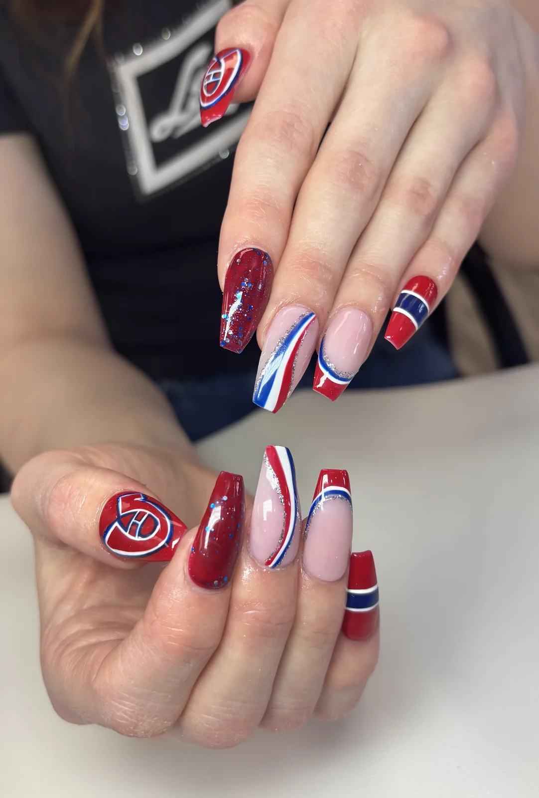 Red white and blue Canadian themed nail art by Top Ten Nails Spa