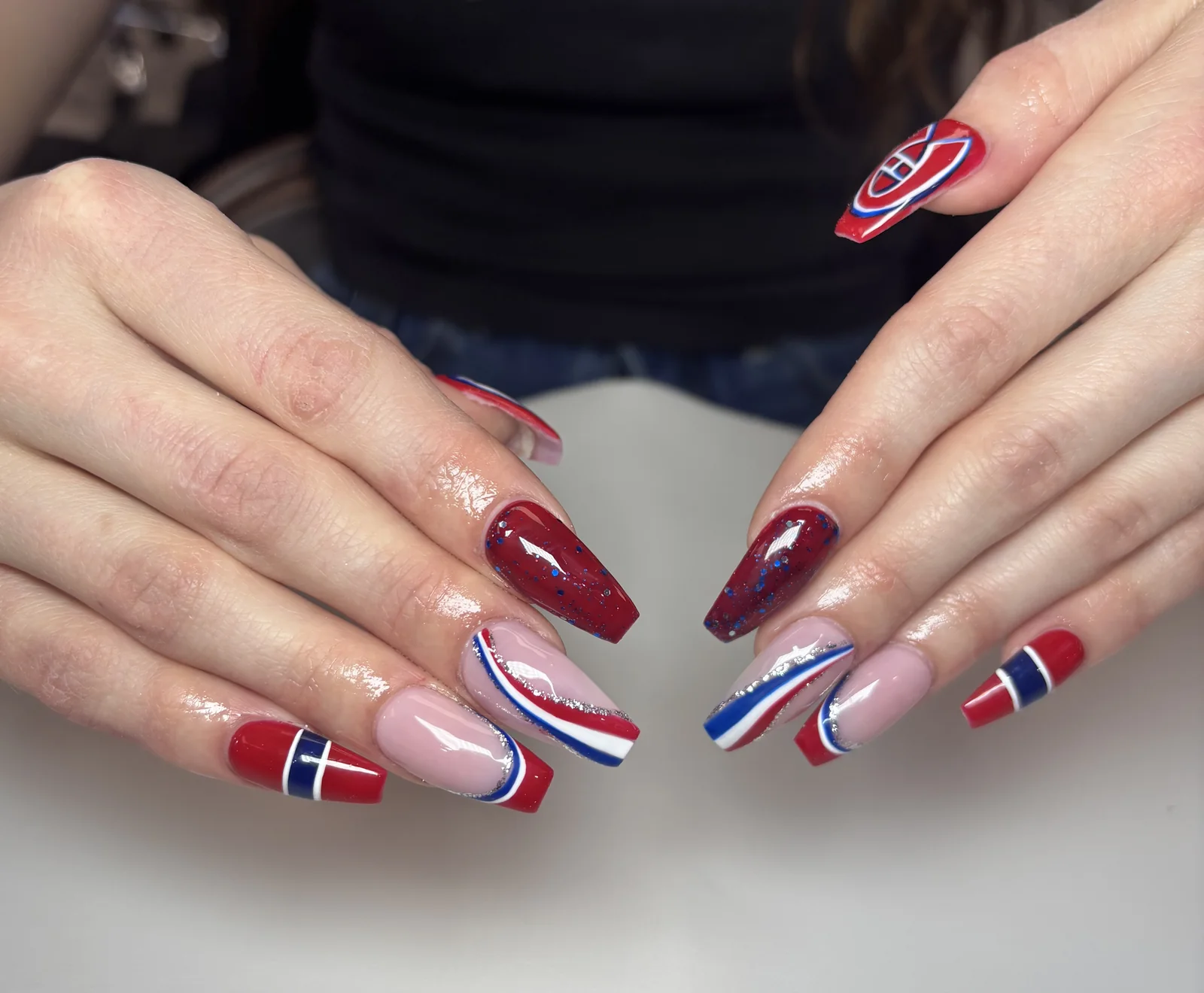 Scarlet red and striped square manicure by Top Ten Nails Spa