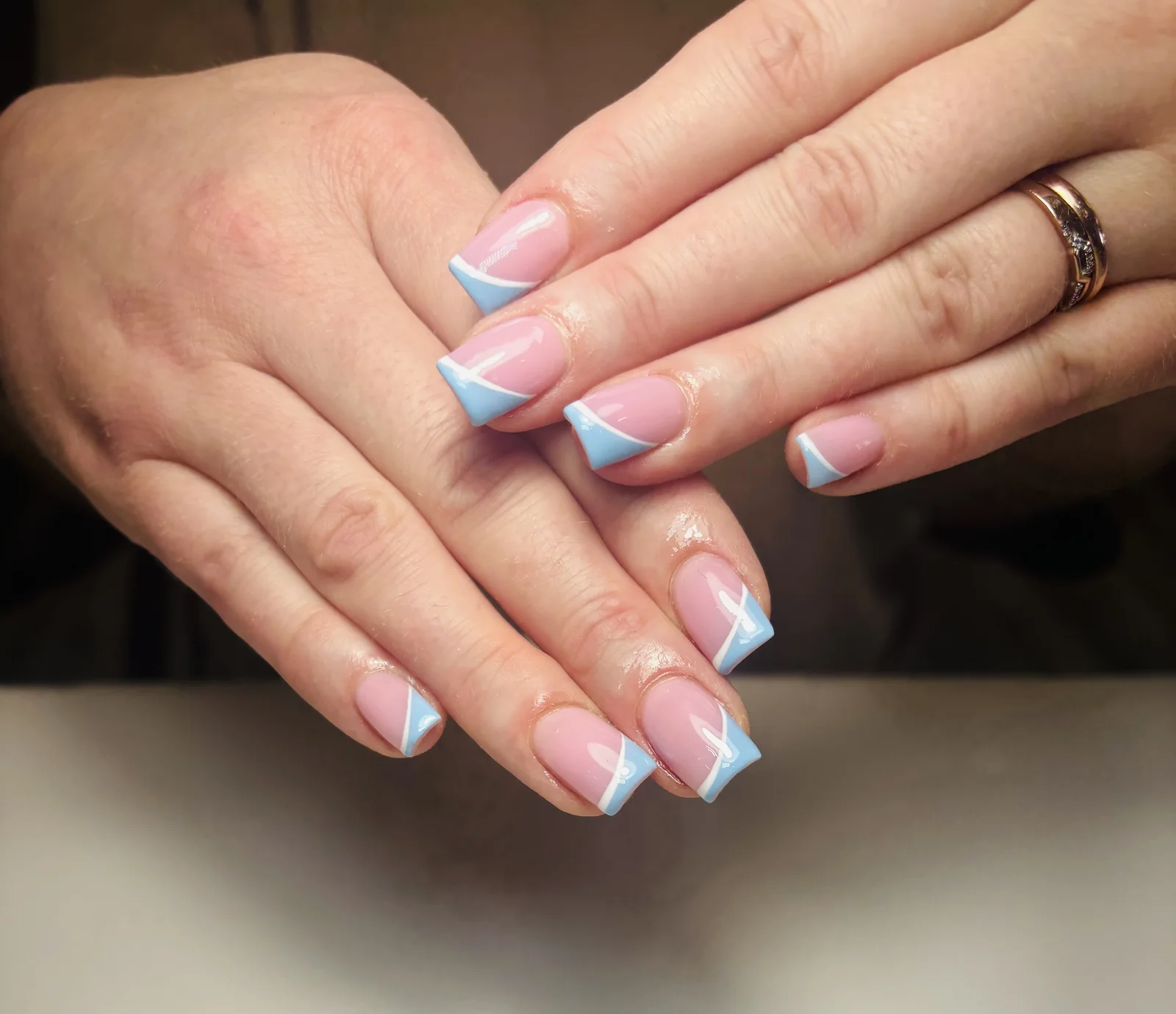 Cotton candy blue and pink geometric French manicure by Top Ten Nails Spa