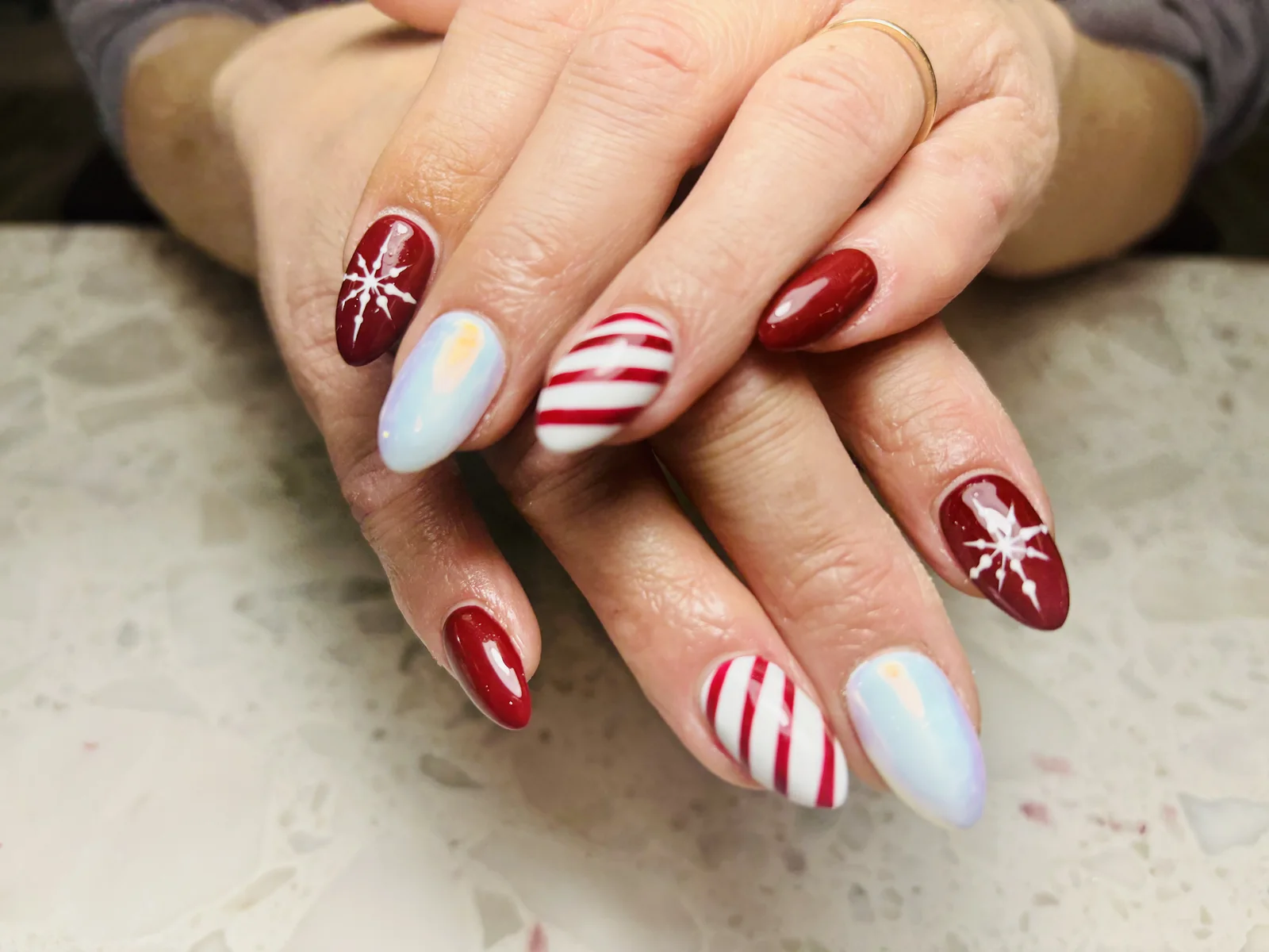 Red white and icy blue holiday manicure by Top Ten Nails Spa